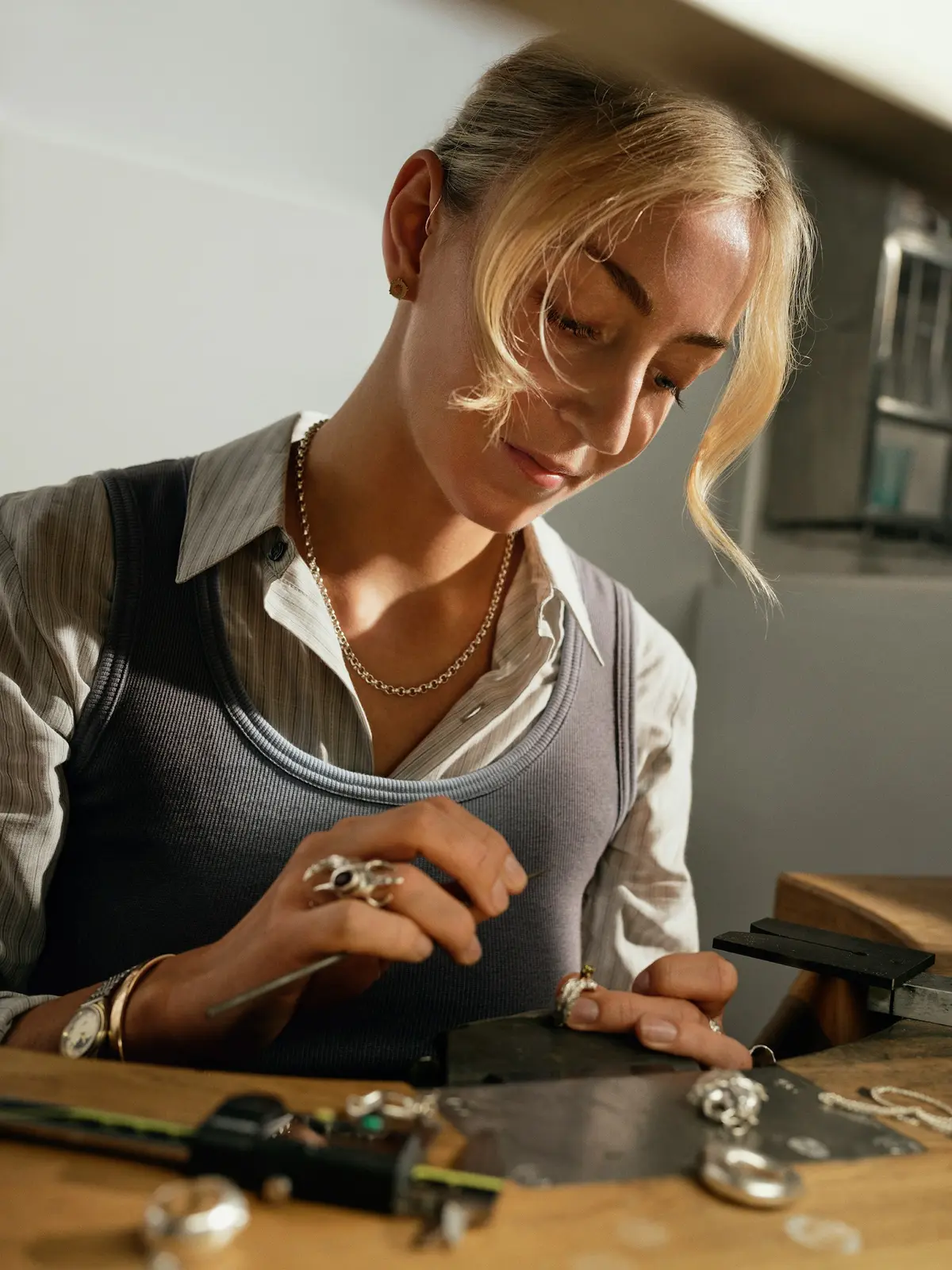 Jeweler working carefully at a traditional bench
